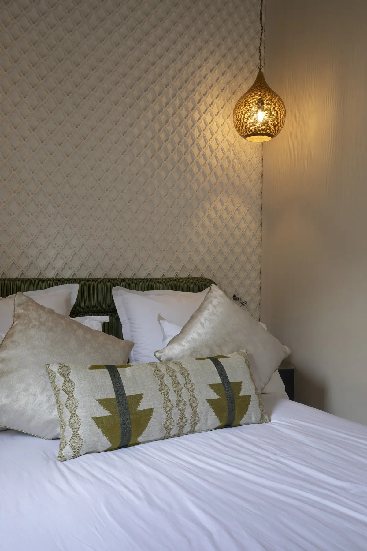 Détail d'une chambre chaleureuse du Riad Mudham